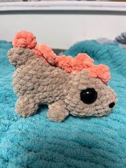 Háčkovaný dinosaurus