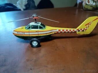 Stará hračka- plechový vrtulník Police- EG36