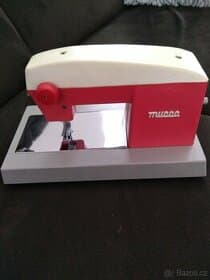 Stará hračka šicí stroj